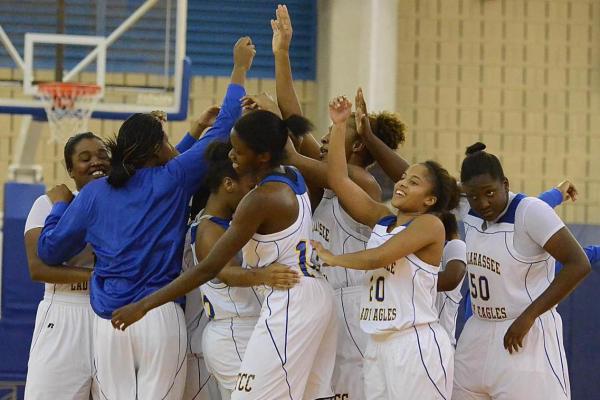 The Lady Eagles celebrate their win over Pensacola State.