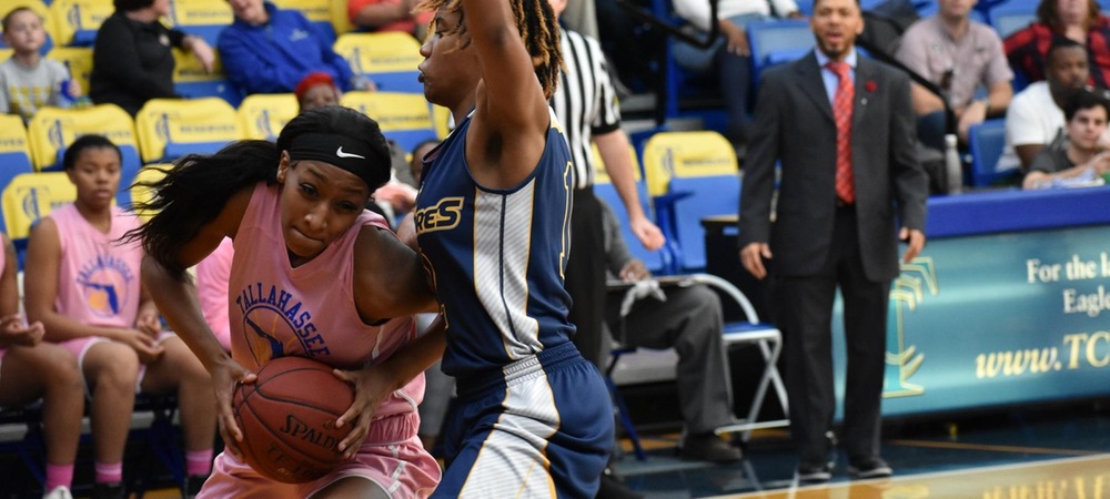 Jada Perry drives by a Gulf Coast State defender (photo courtesy of Jamesha Cobb)