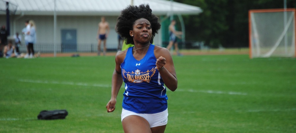 Njaree Collins nears the finish line in the 200m